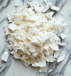 attachment-https://graciousbakers.efsolit.com/wp-content/uploads/2024/07/peterparker5134_coconut_flakes_on_marble_counter_9b9de192-dc76-4bd7-af52-fc35ebeac067-100x107.png